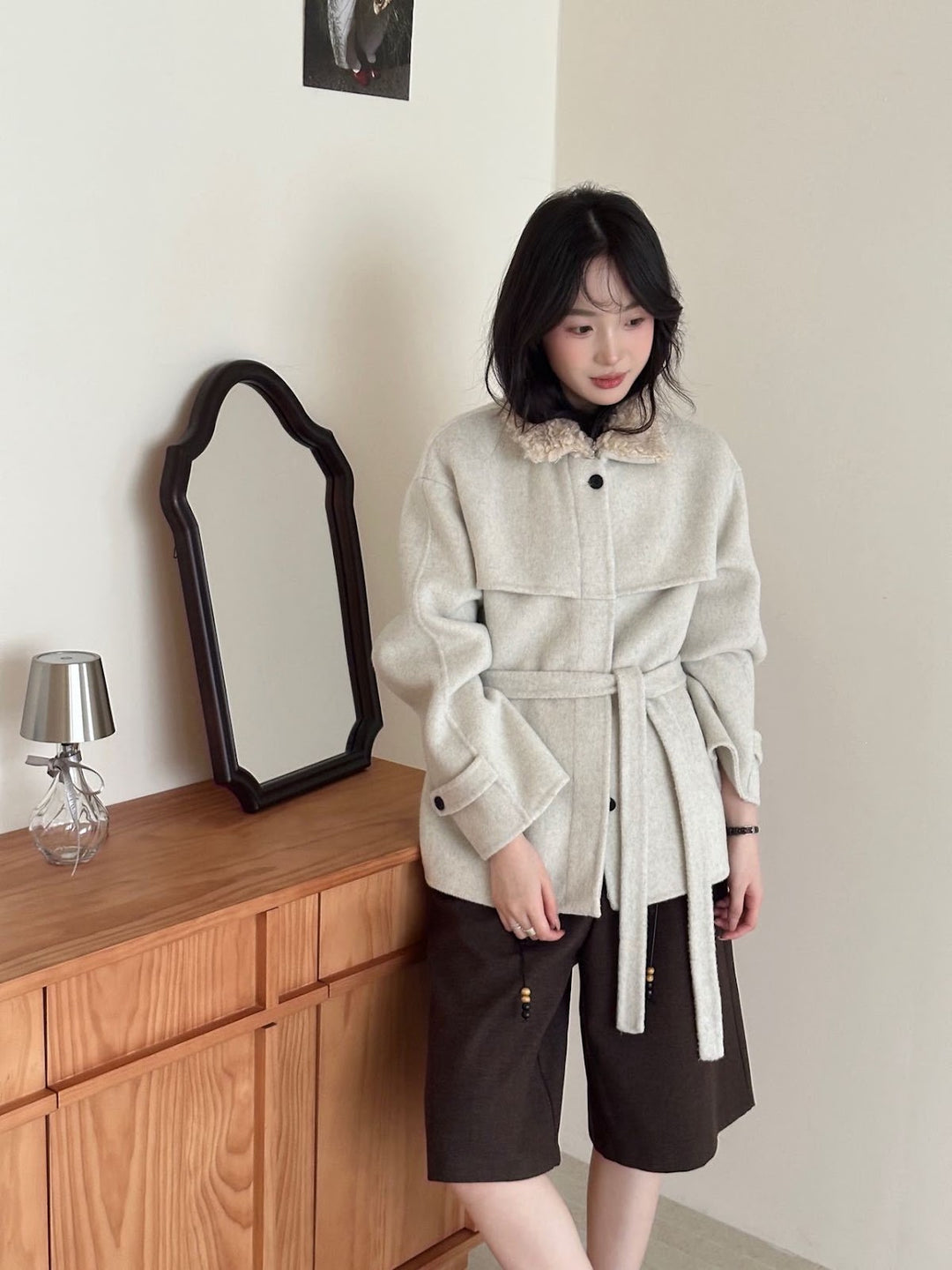 Women's coat with faux sheepskin details, lined