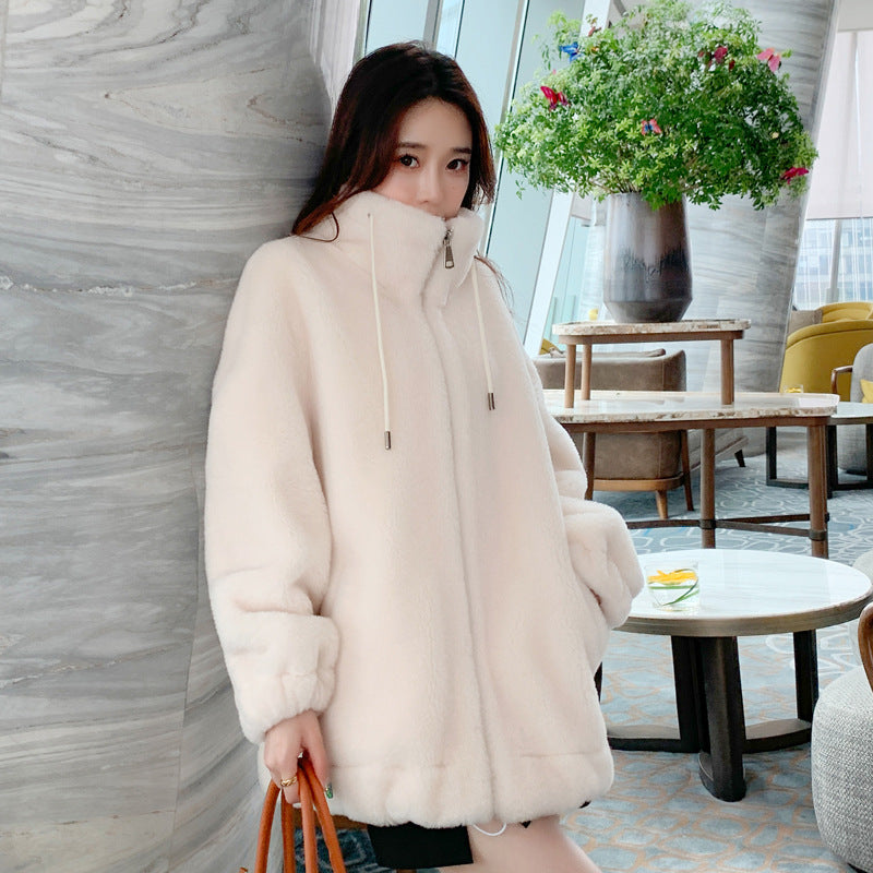 Padded coat made of lambskin imitation