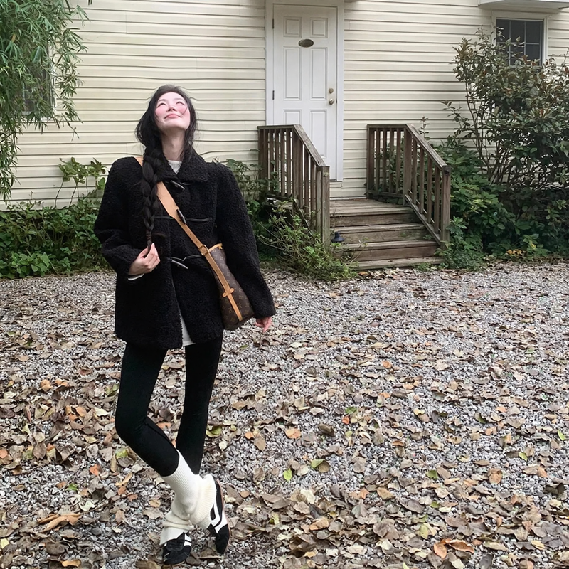 Black coat made of lambskin imitation with toggle buttons
