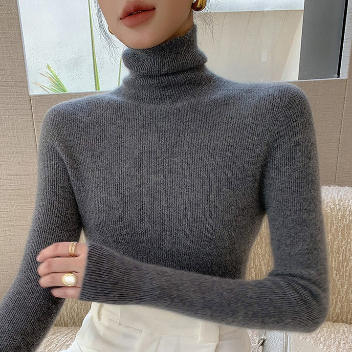 Women's knitted pullover with stand-up collar, fitted