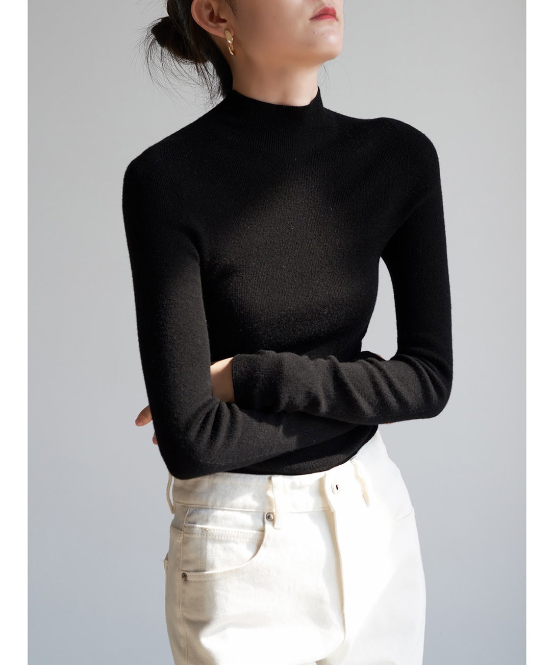 Women's wool knit sweater with stand-up collar