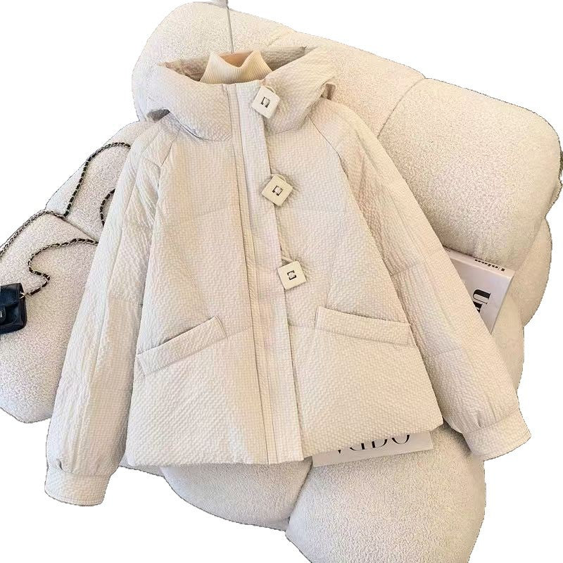 Short women's quilted jacket with hood, loose fit