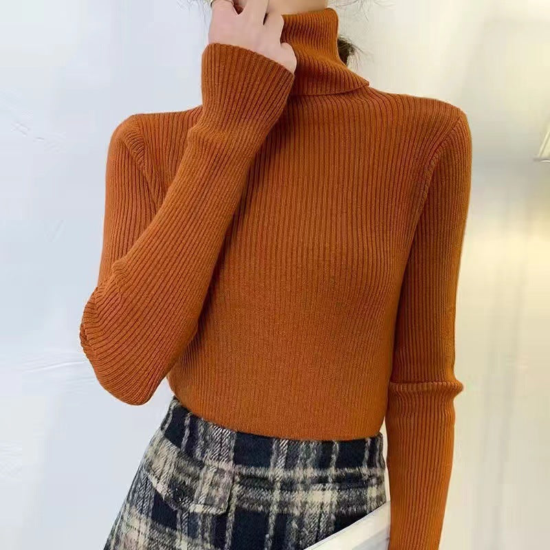 Form-fitting women's turtleneck sweater
