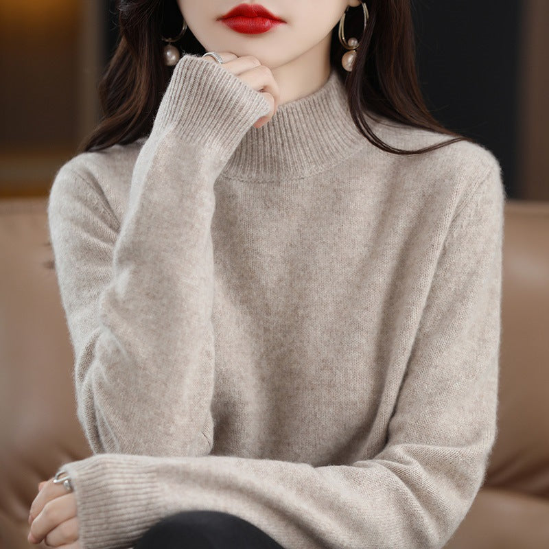 Women's wool pullover with stand-up collar and ribbed texture
