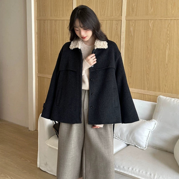 Women's coat with faux sheepskin details, lined