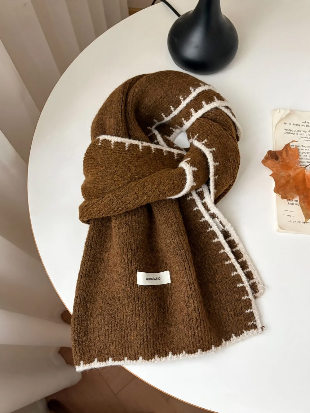 Warm scarf in various shades of brown