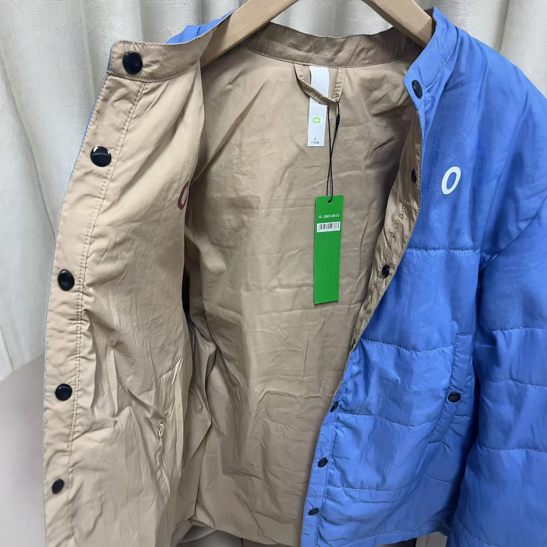Reversible women's quilted jacket, water-repellent, loose fit