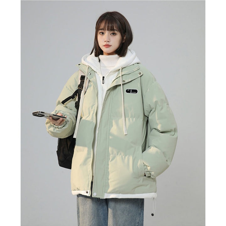 Fleece-lined women's winter jacket in layered look