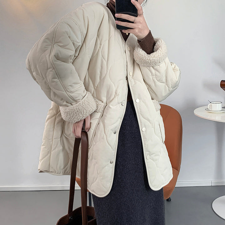 Women's quilted jacket with lambskin inserts and V-neck