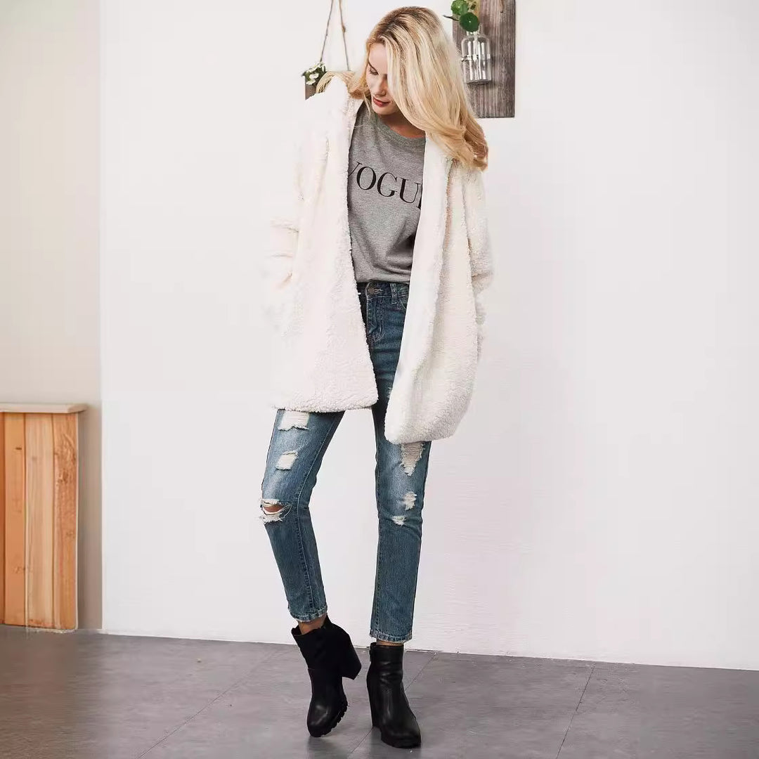 Long women's winter coat with hood in teddy look