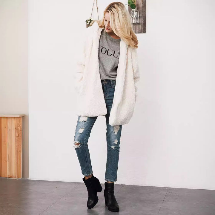 Long women's winter coat with hood in teddy look