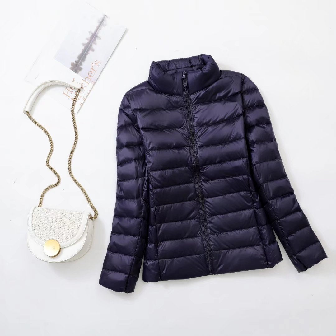 Light women's down jacket, stand-up collar, slim fit