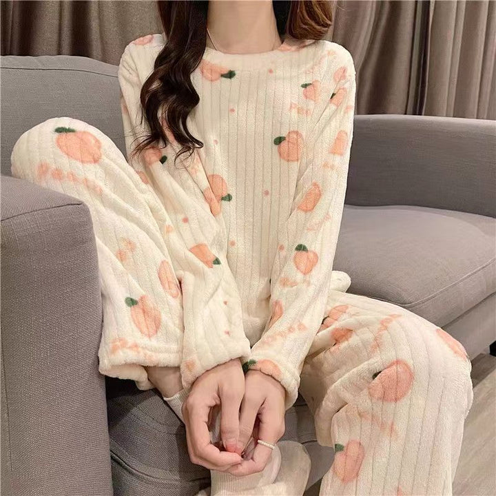 Fluffy coral fleece pajamas with bear motif
