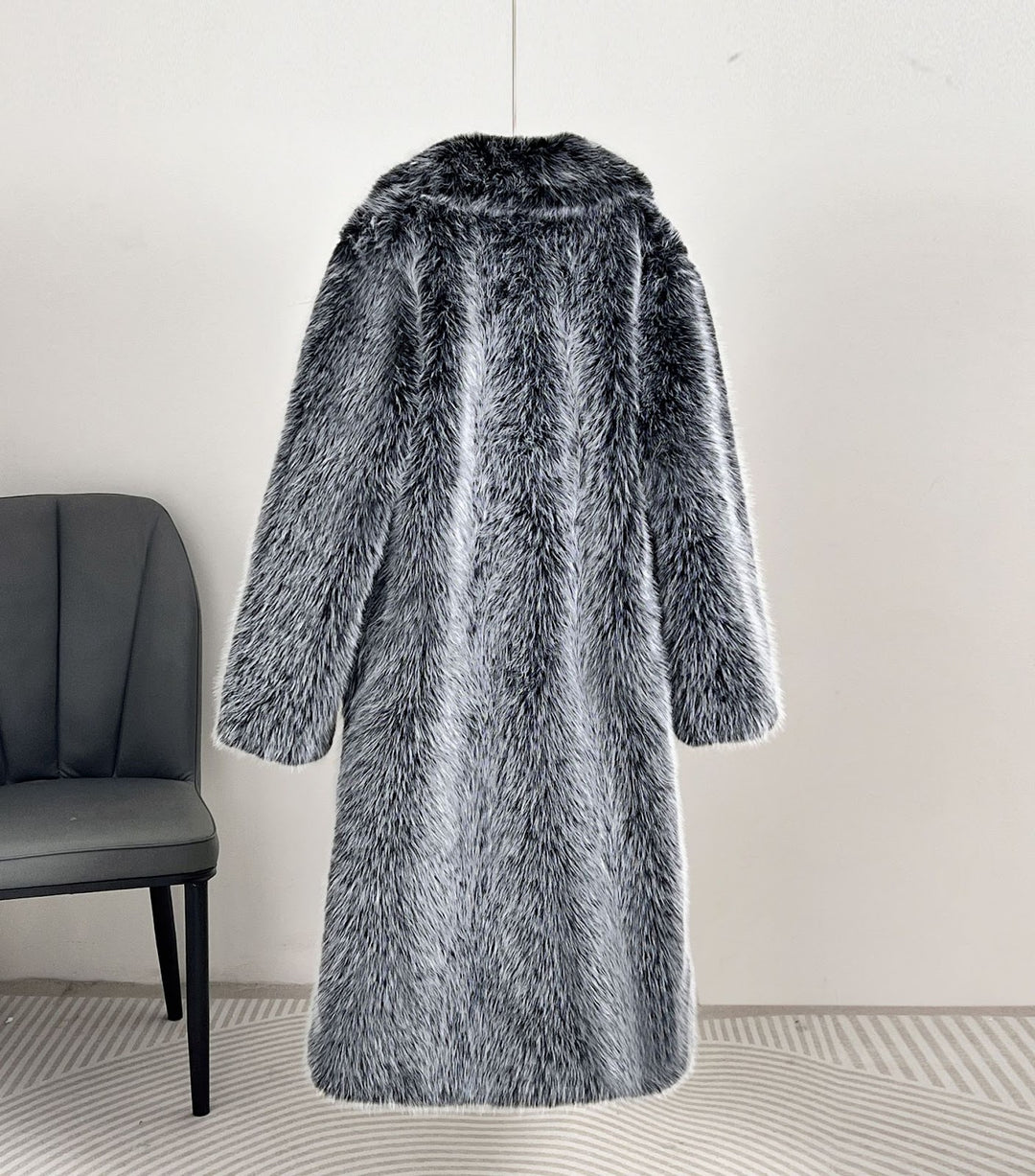 Long women's faux fur coat with lapel collar