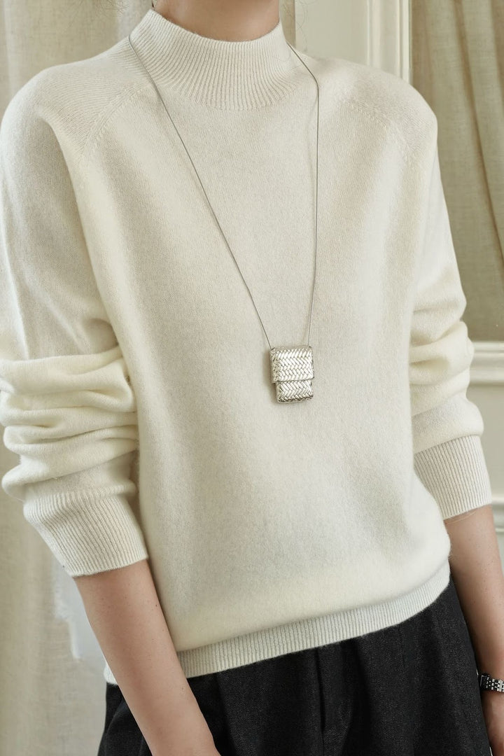 Women's wool sweater with stand-up collar, loosely knitted