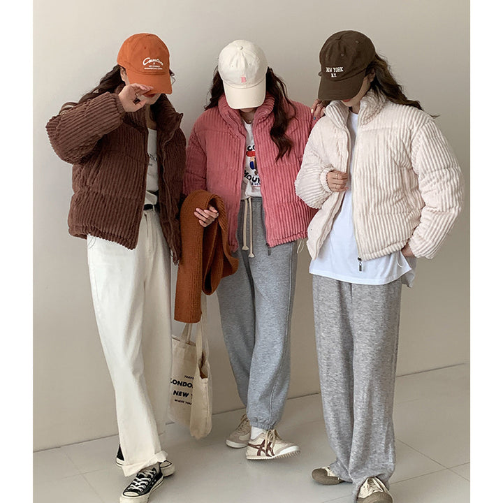 Short women's winter jacket made of corduroy with stand-up collar