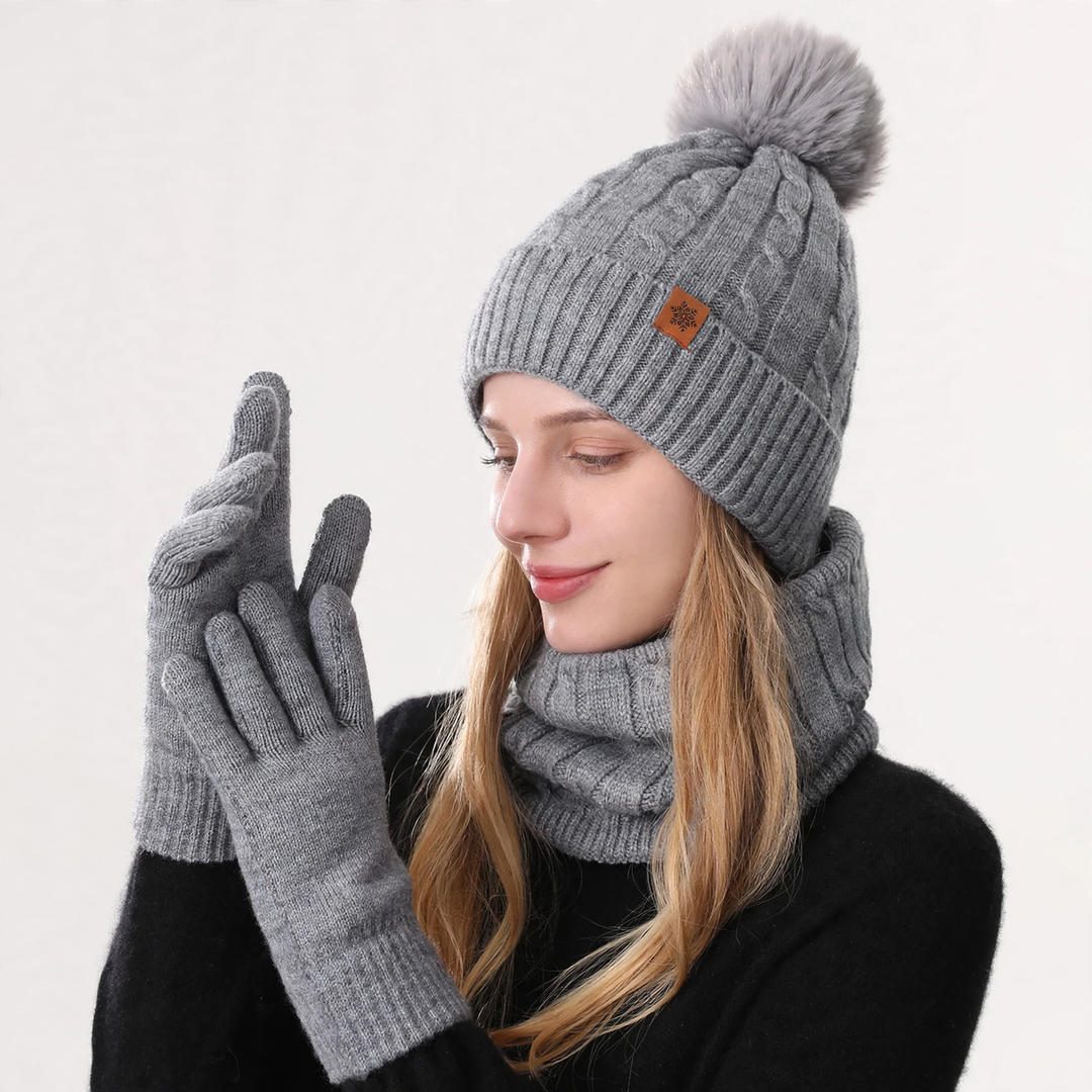 Winter set consisting of knitted hat, scarf, and gloves