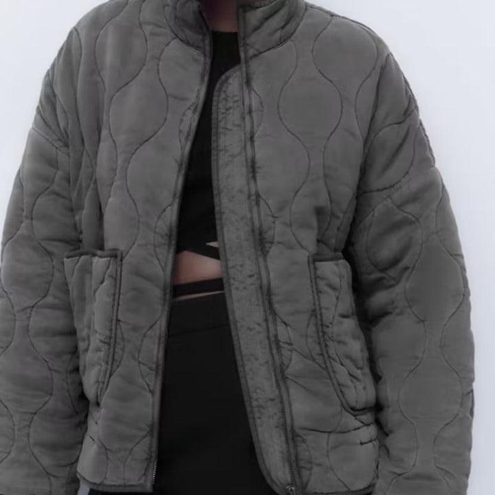Women's padded jacket with stand-up collar and tie belt
