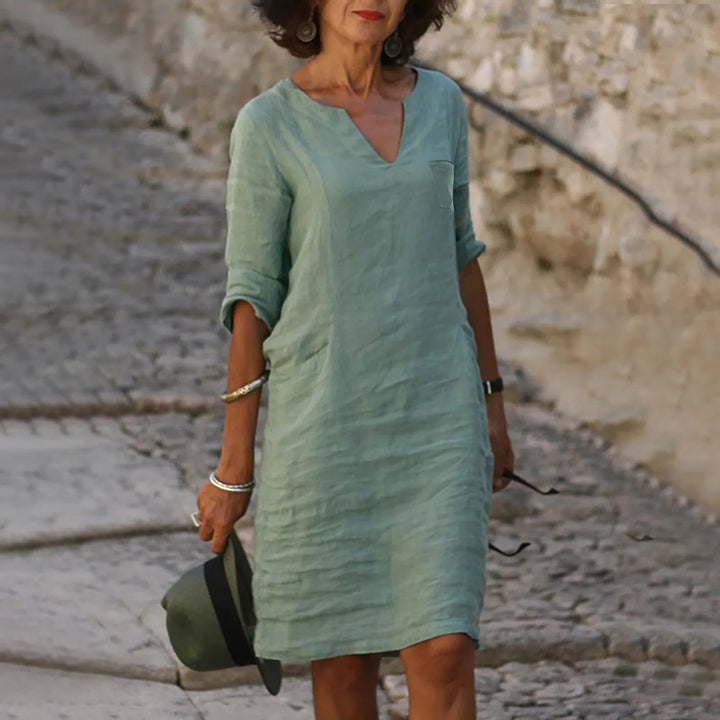 Linen shift dress with V-neck and pockets
