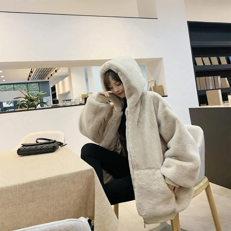 Long women's faux fur coat with hood