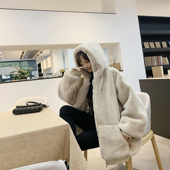 Long women's faux fur coat with hood