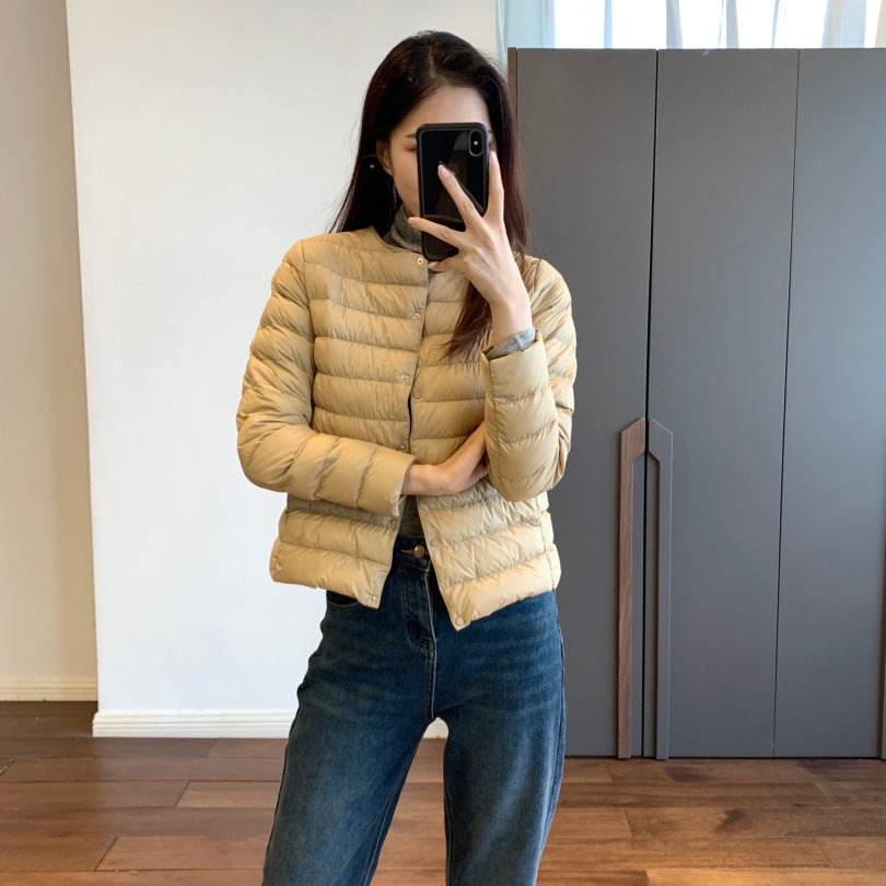 Light women's down jacket, short, with goose feathers
