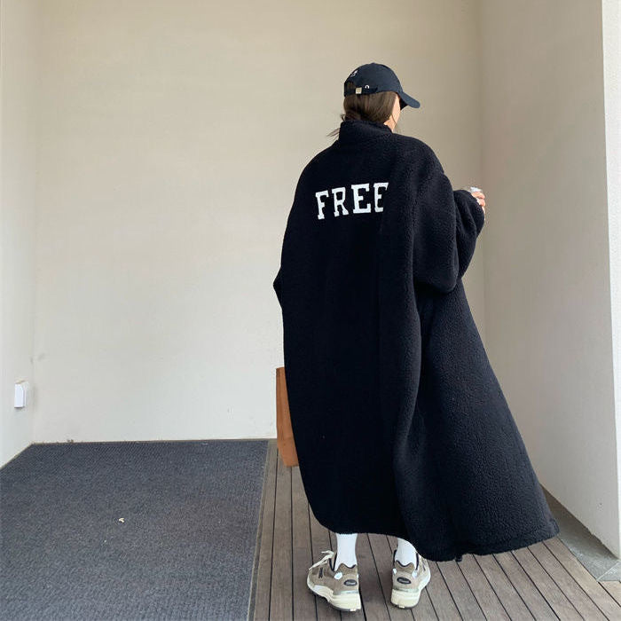 Long women's coat made of lamb fleece, stand-up collar, single-breasted