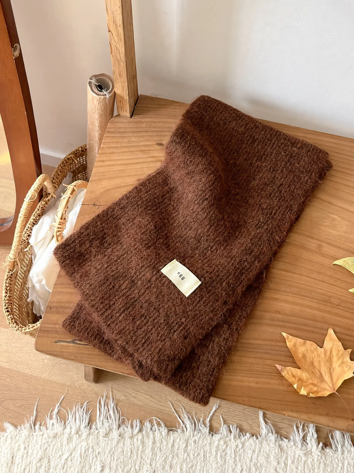 Warm scarf in various shades of brown