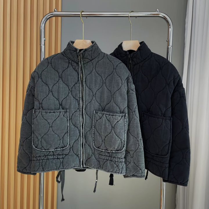 Women's quilted jacket with standing collar and tie belt