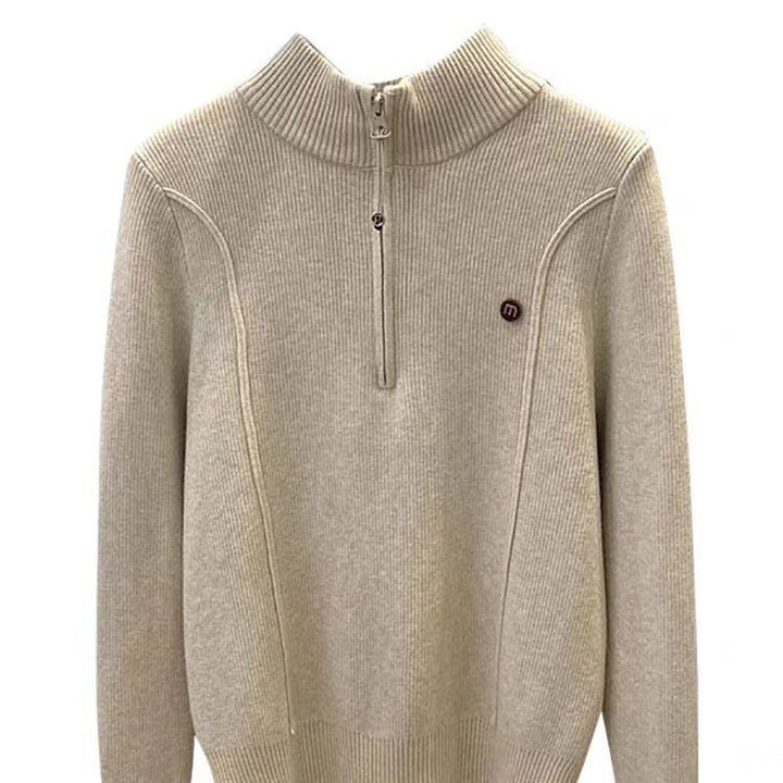 Padded women's knitted sweater with zipper and stand-up collar
