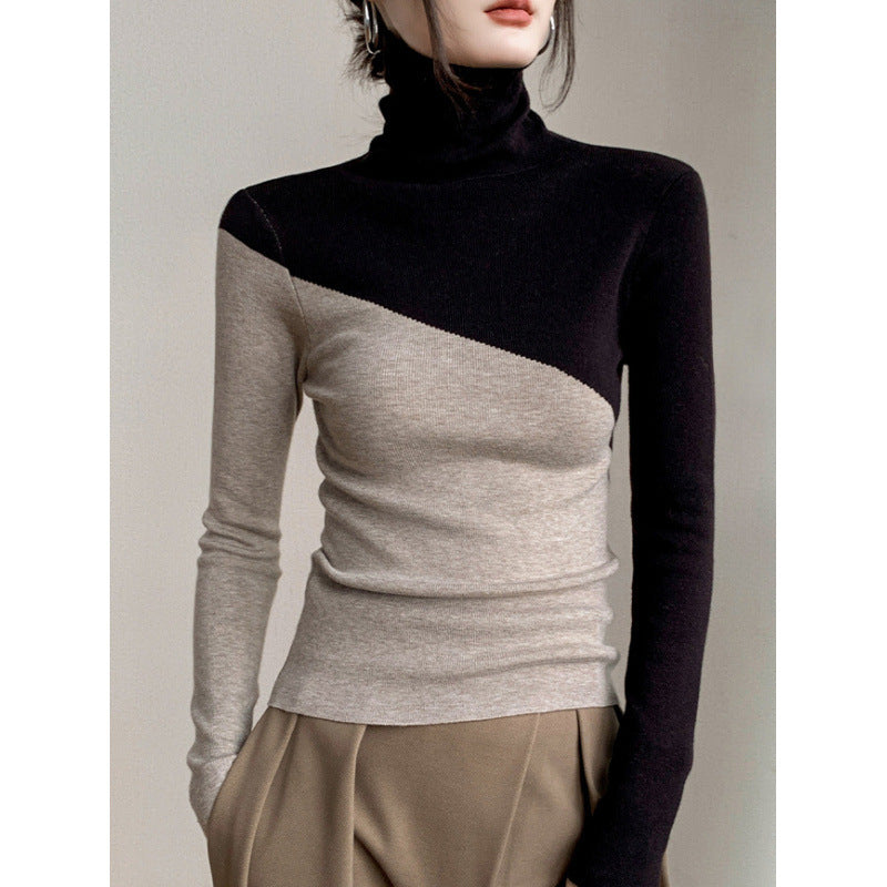 Narrow knit sweater with stand-up collar and color accents