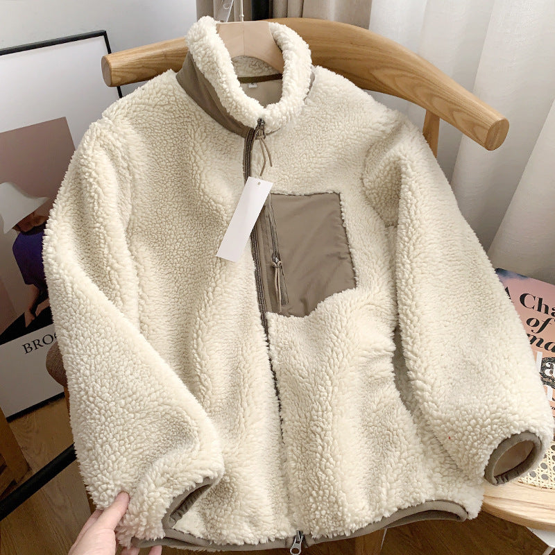 Casual women's jacket made of lambskin imitation with zipper