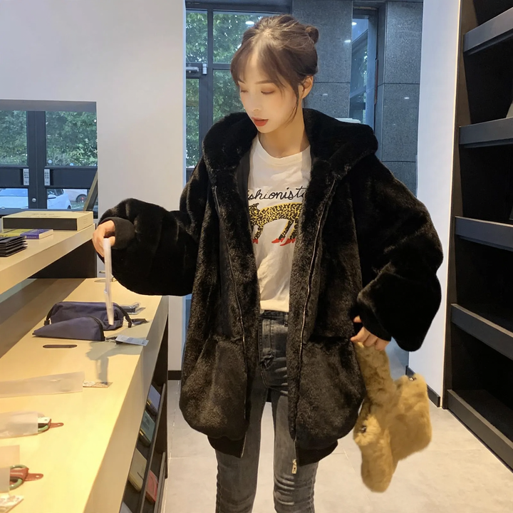 Loosely cut women's faux fur jacket with hood