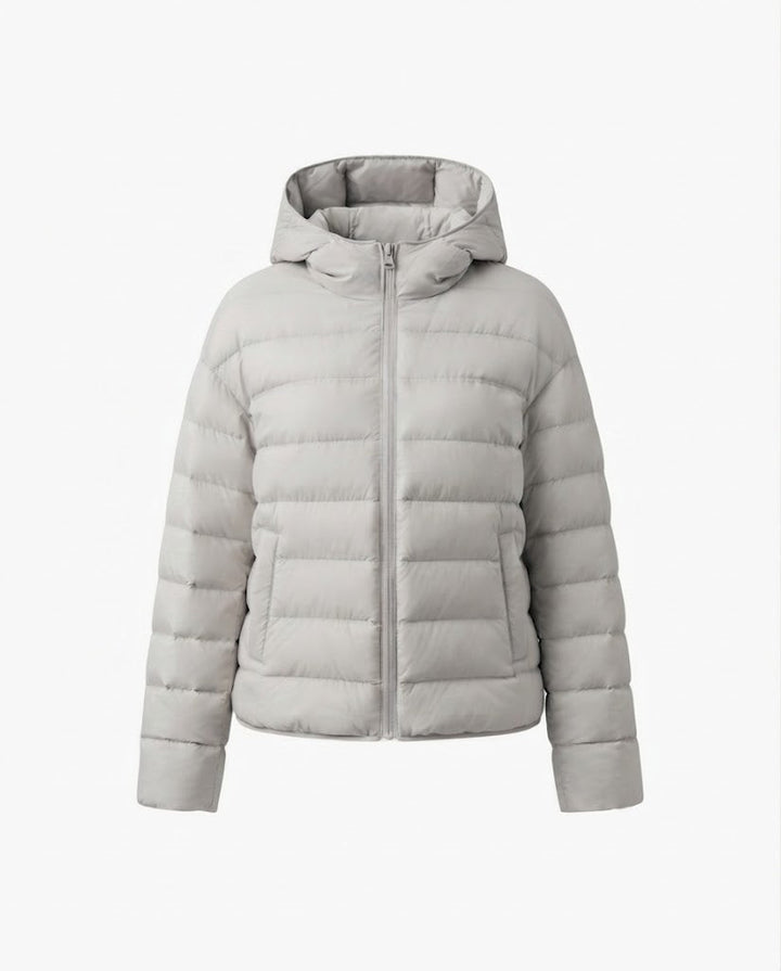 Women nan minimalist short thermo quilted jacket with ergonomic hood, tailored seam design and windproof outer shell