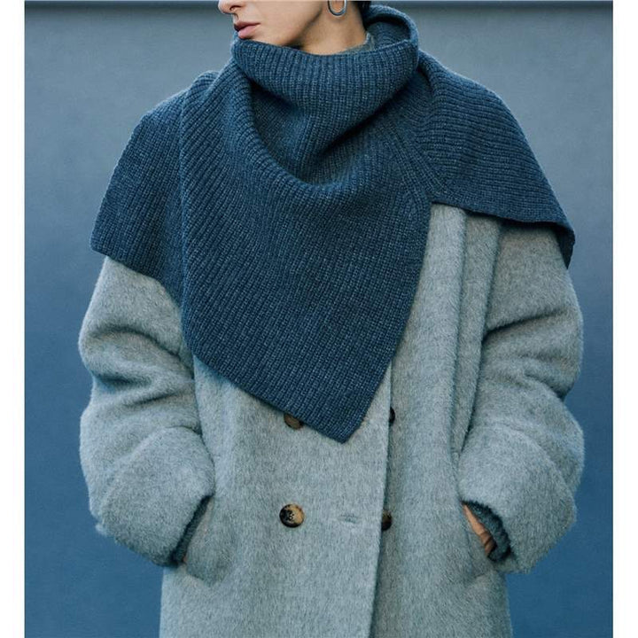 Knitted shoulder warmer made of merino wool with slit