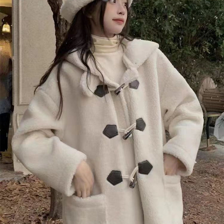 Long coat with toggles and lambskin look