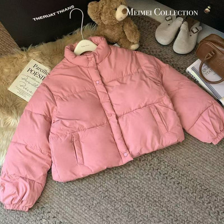 Short women's quilted jacket in a loose fit