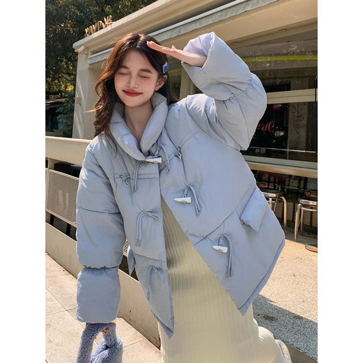 Short women's quilted jacket in oversized look with toggle buttons