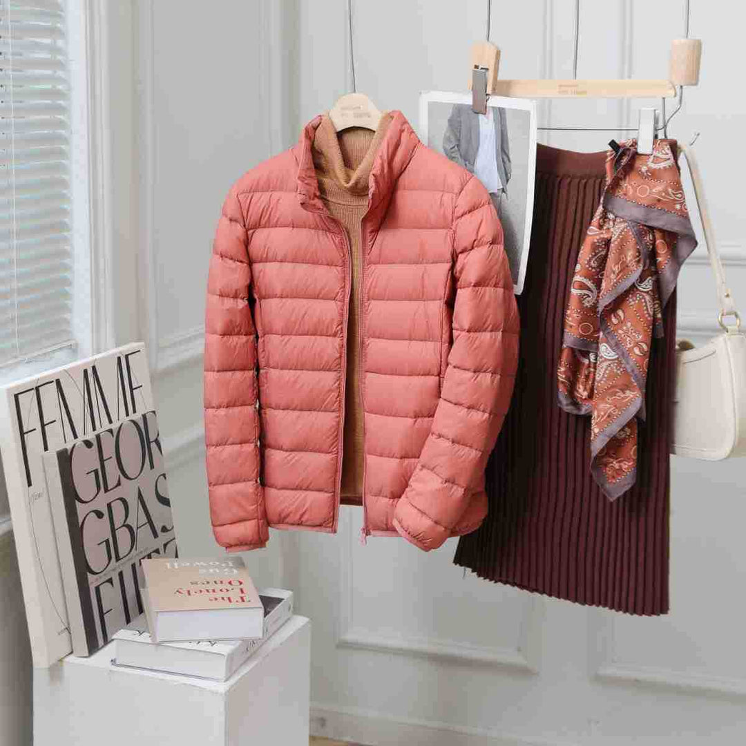 Light women's down jacket with stand-up collar, white duck down