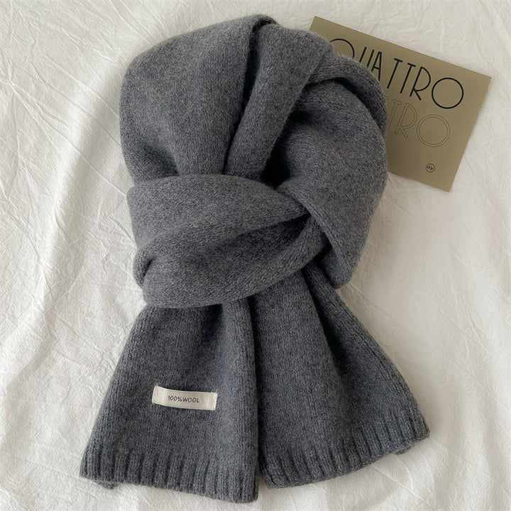 Simple knitted scarf made of pure wool