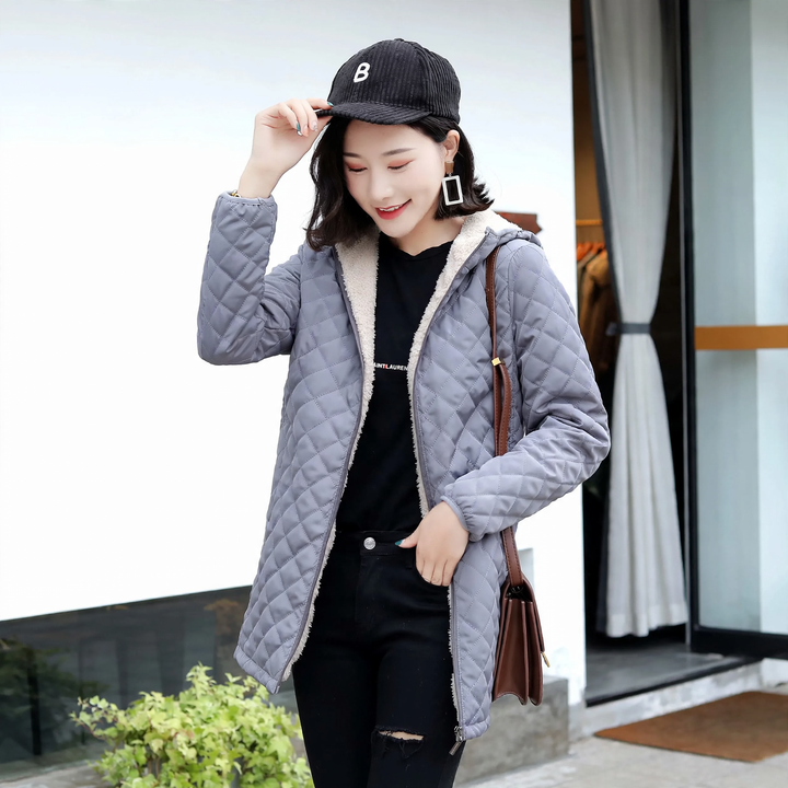 Women's quilted coat with hood and lambskin look