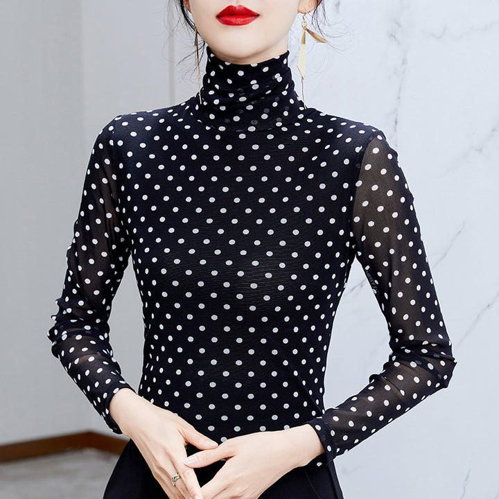 Women's top with stand collar and polka dot pattern
