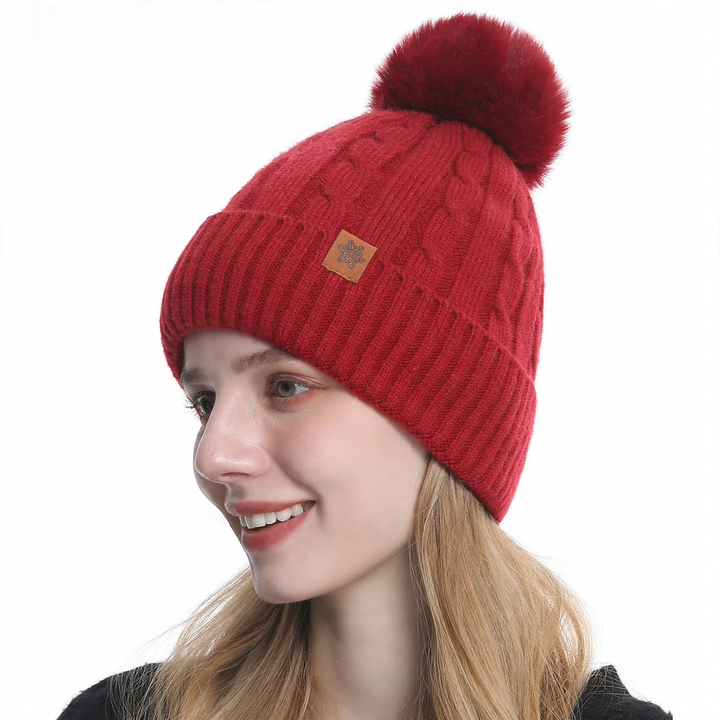 Winter set consisting of knitted hat, scarf, and gloves