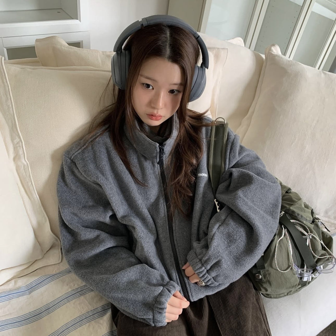 Fleece jacket with stand-up collar, zipper and embroidery