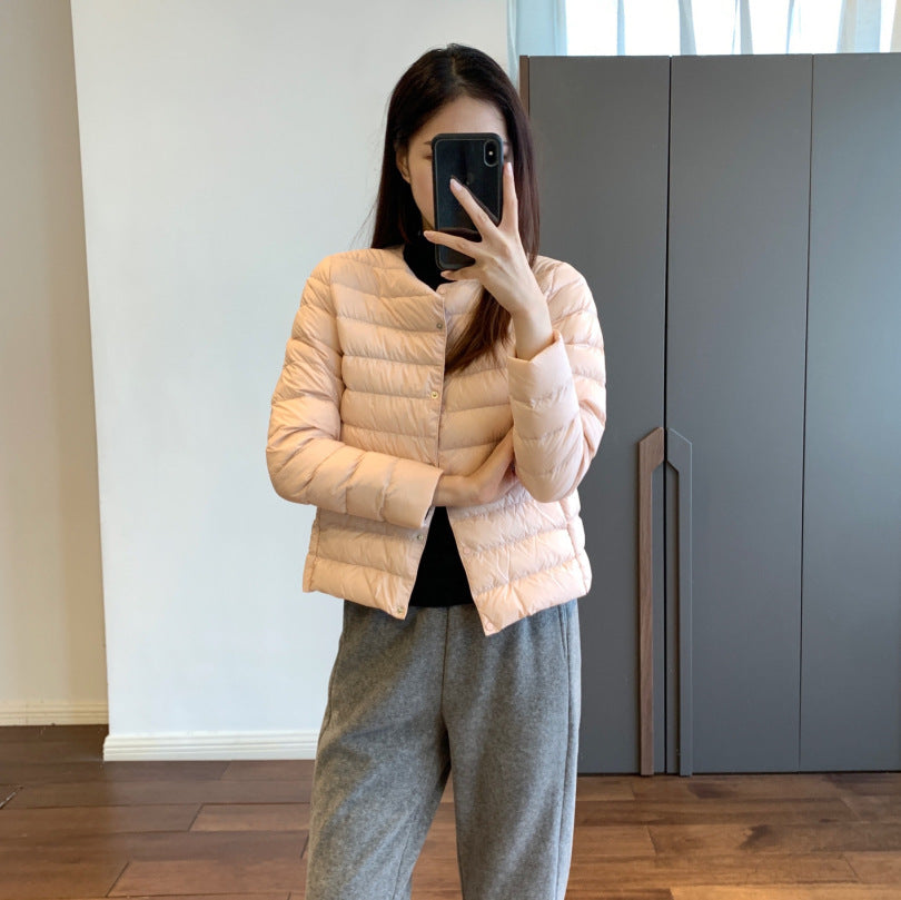 Light women's down jacket, short, with goose feathers