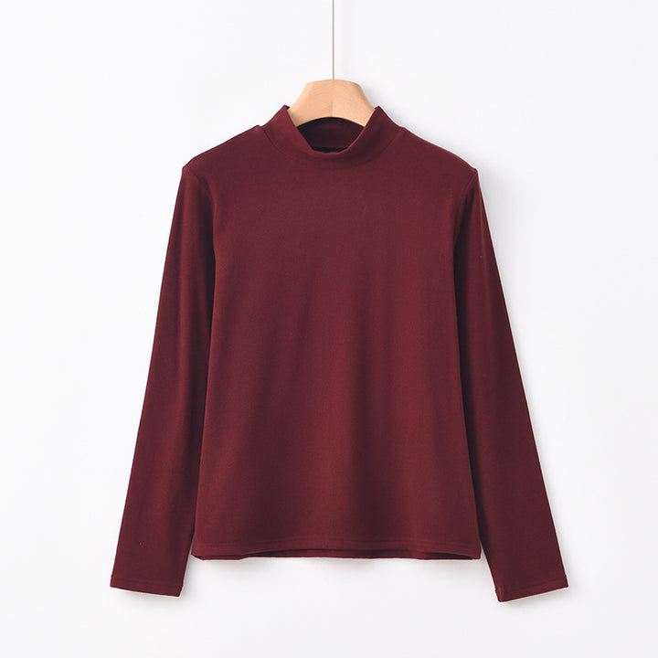 Warm knitted pullover with stand-up collar