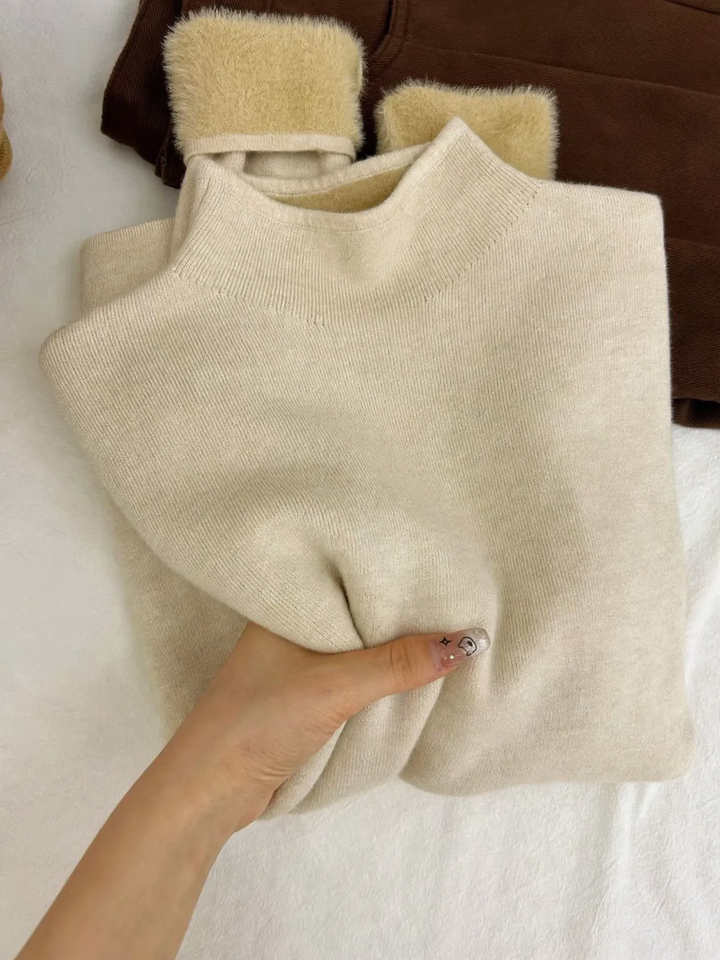 Ladies knitted pullover with stand-up collar, lined
