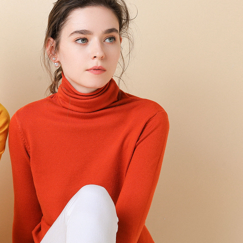 Women's knitted pullover with stand collar and geometric pattern