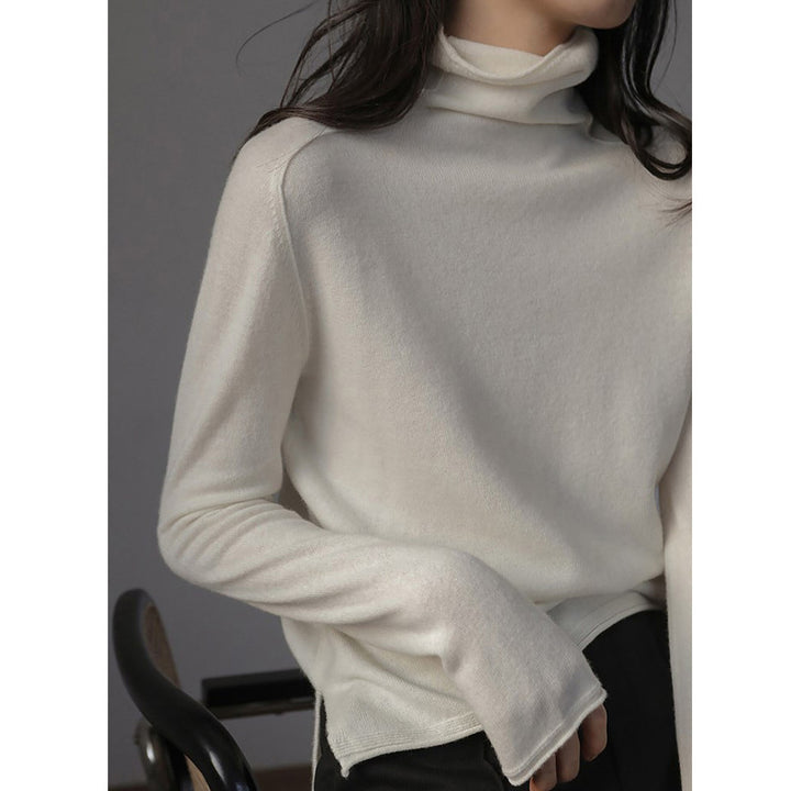 Women's wool sweater, stand-up collar, loose fit with slit