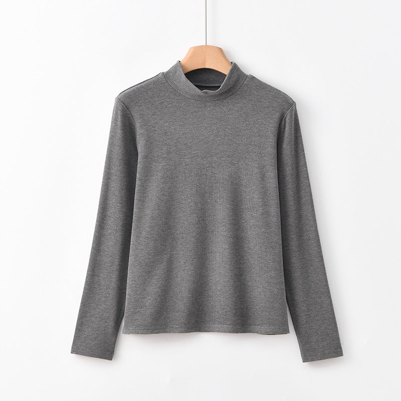 Warm knitted pullover with stand-up collar